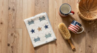 A Basically All-Wood Paneled '70S Bathroom Got An Americana Folk Makeover